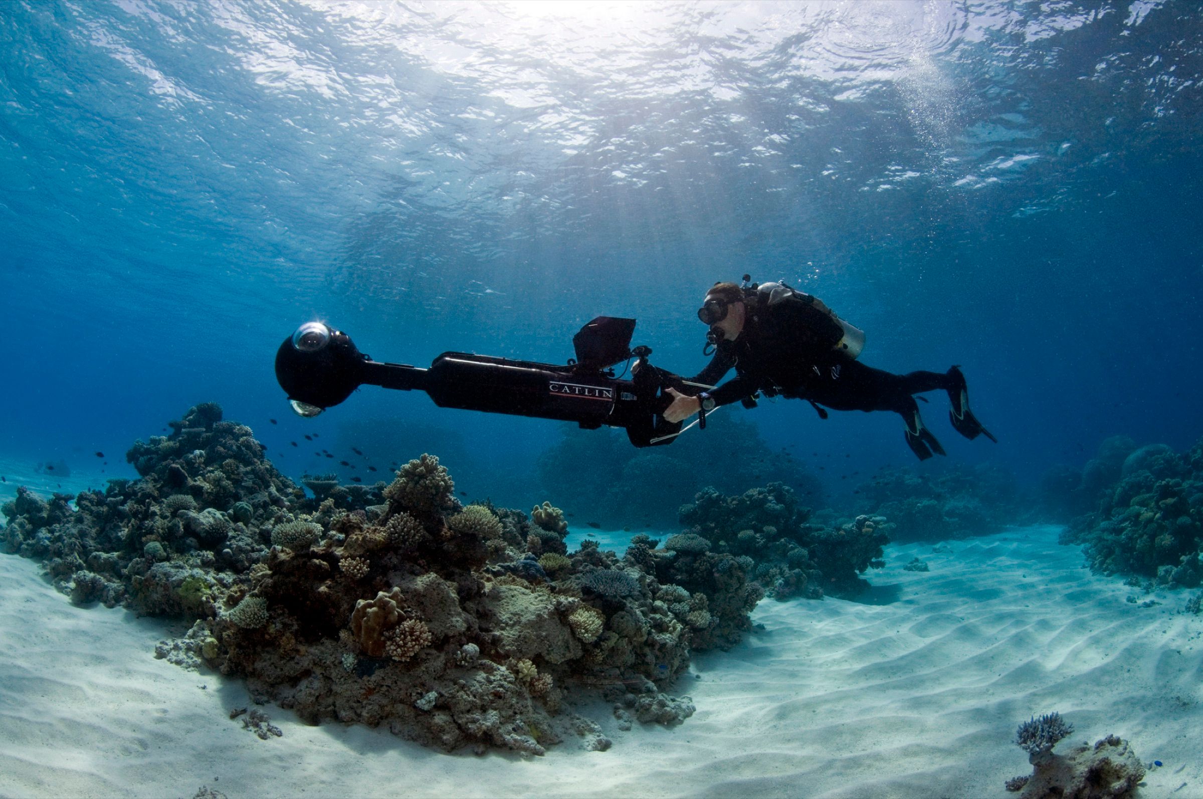 Aerial view of a coral sea — the world above the world Chasing Coral documents